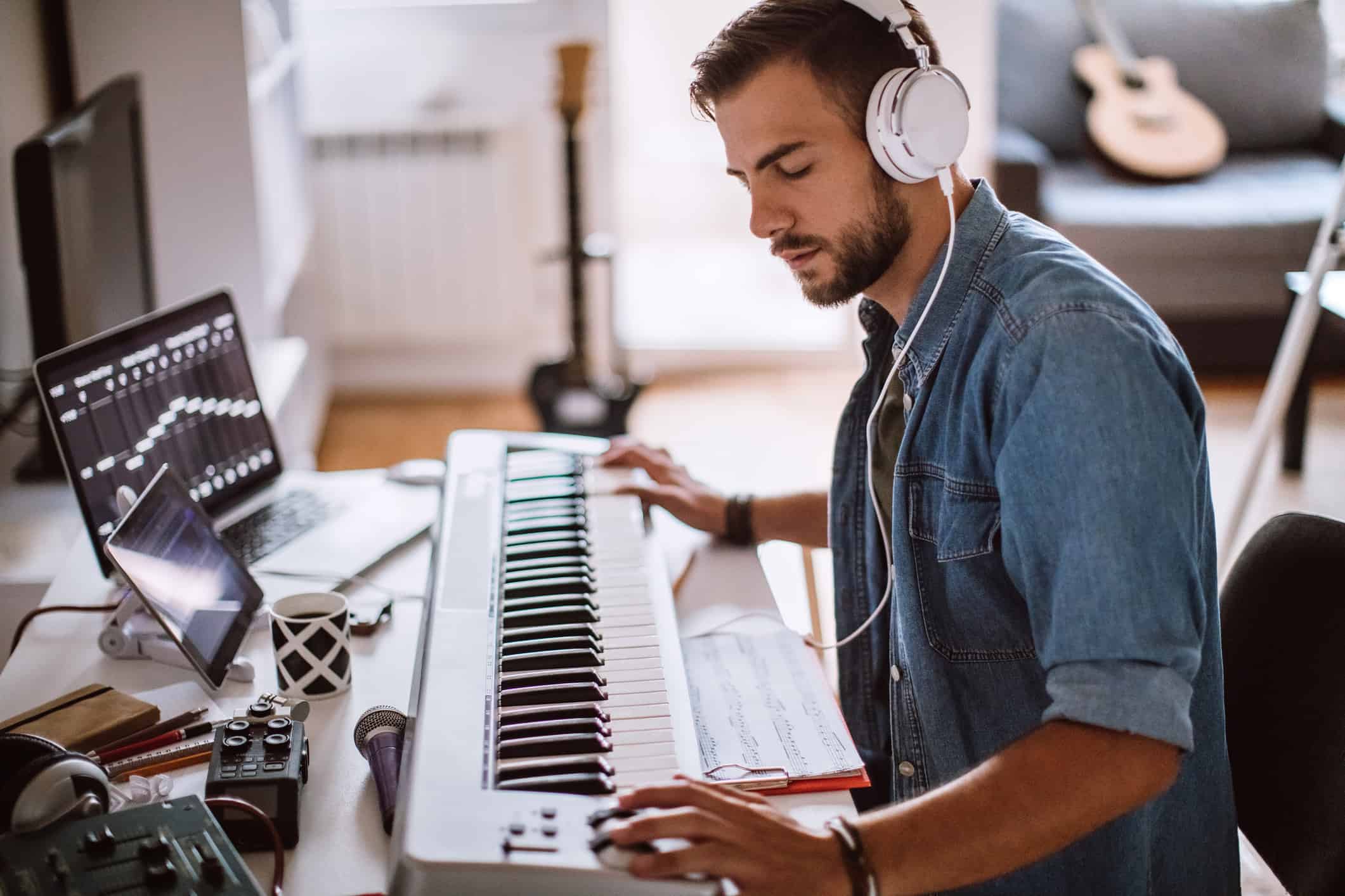 Musician playing on keyboard instead of digital piano