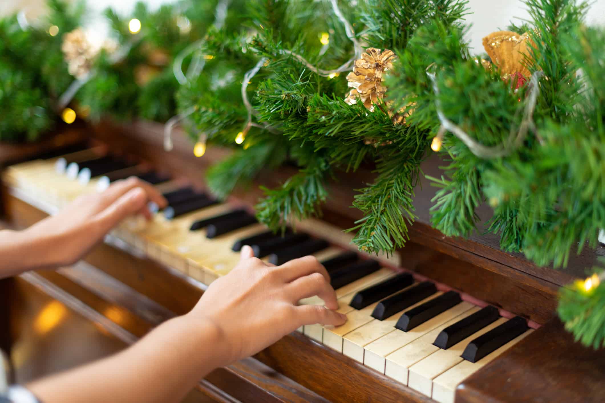 Piano decorated for Christmas for Christmas gift surprise for family